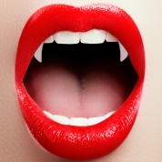 Sexy-Woman-lips-with-bloody-lipstick.-Fashion-Glamour-Halloween-art-design.-Vampire-girl-getting-ready-to-celebrate-Halloween-943785940_3000x3000.jpg